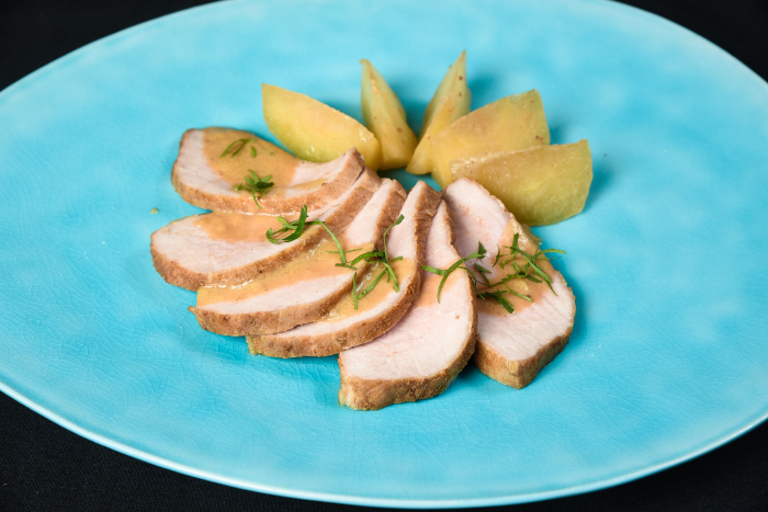 Cerdo con manzanas